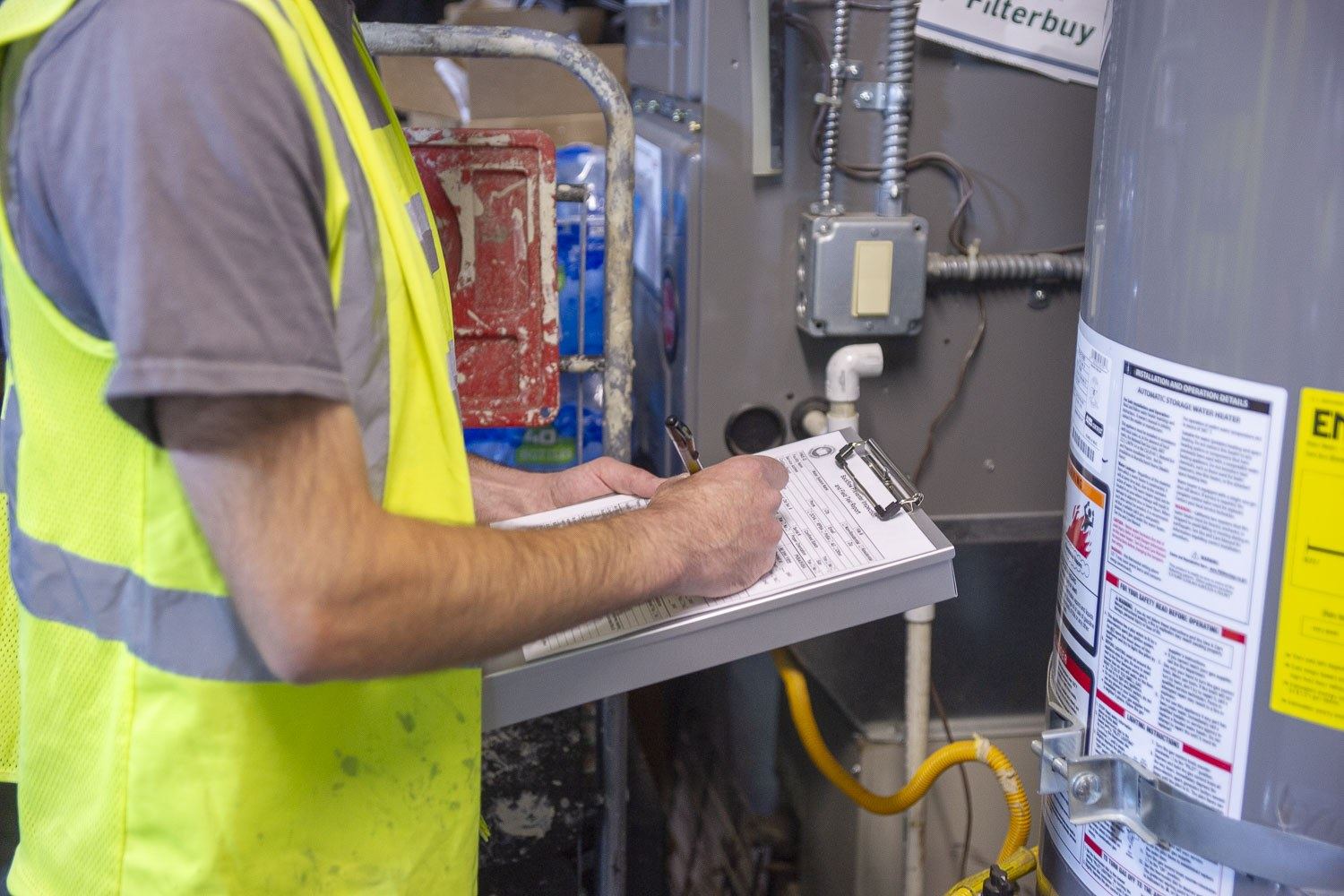 Technician documenting an inspection